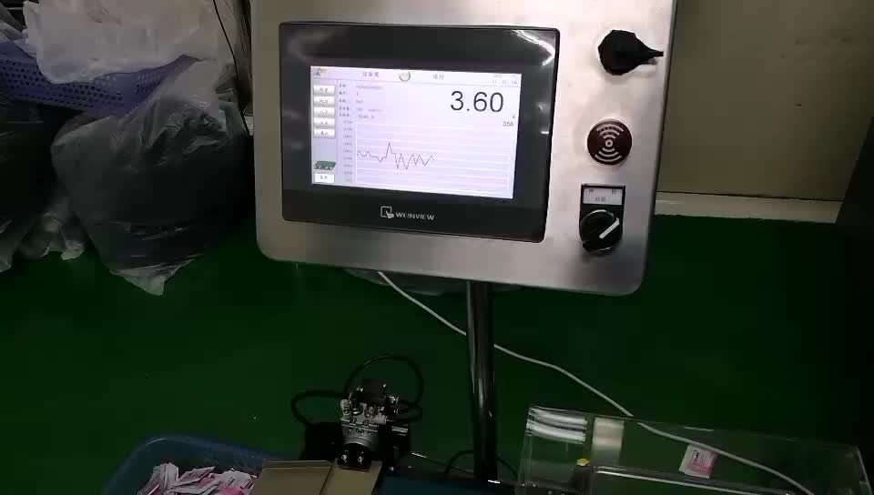 立式包裝機對接檢重秤