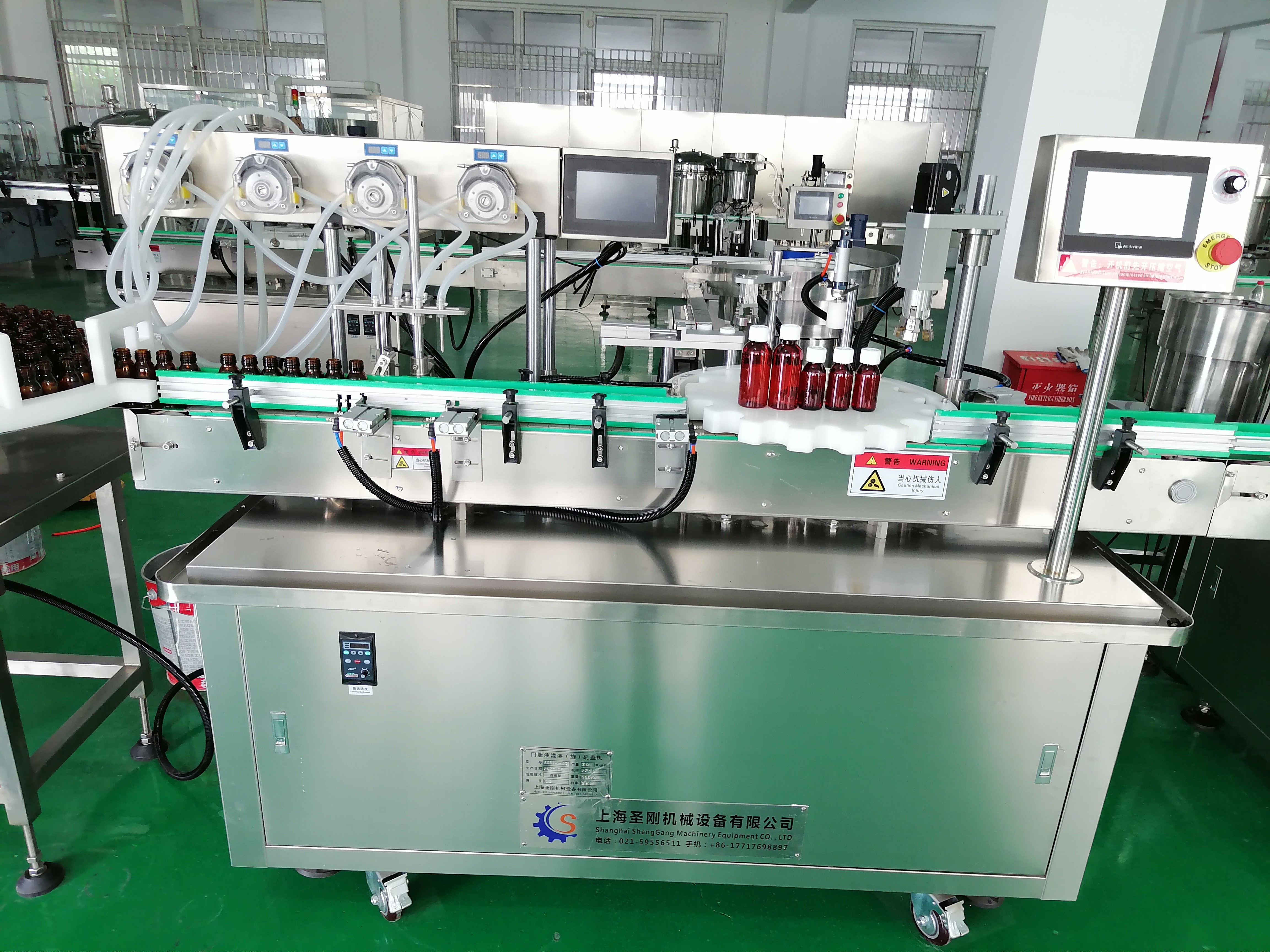 上海圣剛30-50ml高速口服液灌裝機打造行業(yè)規(guī)范